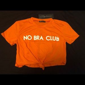 “No Bra Club” neon orange crop tops